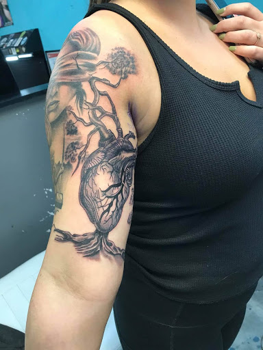 Explore overcoming tattoo ideas, creative tattoo ideas in Indianapolis, available at Revved Up Tattoos