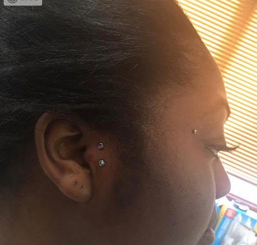 Explore libra tattoo ideas for guys, creative tattoo ideas in Milwaukee, available at Piercings Plus