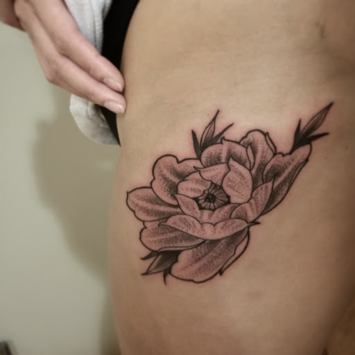 Explore taz tattoo ideas, creative tattoo ideas in Fremont, available at Inkies Tattoo Studio