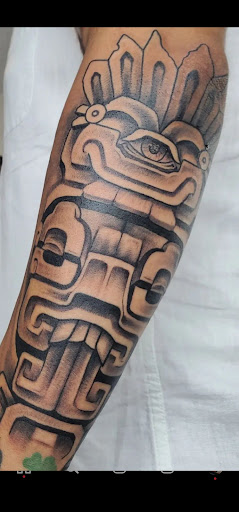 Explore female chest piece tattoo ideas, creative tattoo ideas in Riverside, available at Darkstar Tattoo CA