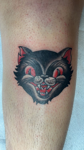 Explore forearm cross tattoo ideas, creative tattoo ideas in Brighton, available at Ghost in the Machine Tattoo