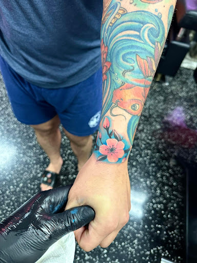 Explore calcifer tattoo ideas, creative tattoo ideas in Fort Myers, available at Loyal 2 The Coil Tattoos & Piercings (Edison Mall Location Entrance F)