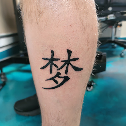 Explore fine line name tattoo ideas, creative tattoo ideas in Traverse City, available at Pinups & Needles