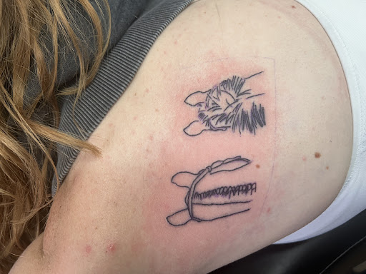 Explore ortiz tattoo ideas, creative tattoo ideas in Clive, available at Wild Rose Tattoo & Piercing
