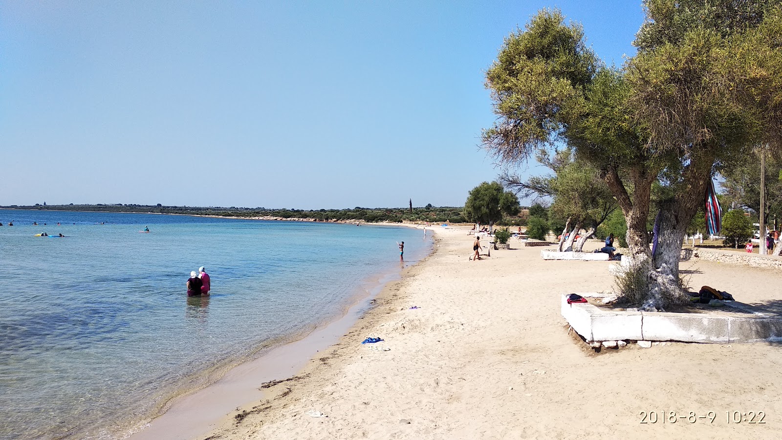 Fotografie cu Fevzi Cakmak beach cu o suprafață de nisip maro