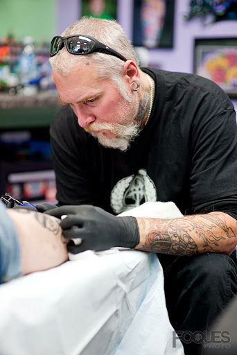 Explore lower arm sleeve tattoo ideas, creative tattoo ideas in Deerfield, available at Maximum Tattoo