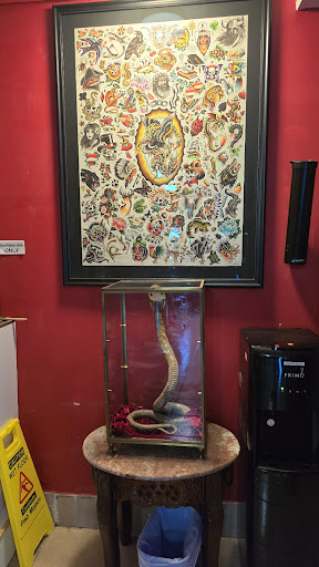 Explore cover up tattoo ideas for upper arm, creative tattoo ideas in Round Rock, available at Supernova Tattoo Parlour