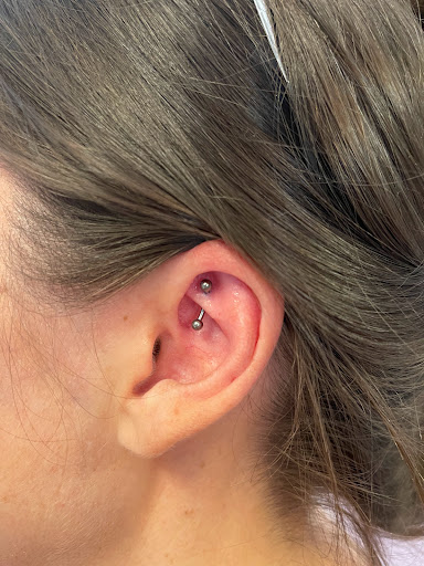 Explore wife name tattoo ideas for husband, creative tattoo ideas in Palm Harbor, available at Angry Owl Tattoo and Piercing