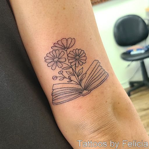 Explore bible tattoo ideas for men, creative tattoo ideas in Fort Myers, available at Tiger Lotus Tattoo and Piercing