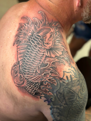 Explore leg tattoos men ideas, creative tattoo ideas in Calhoun, available at Ink Factory Tattoos