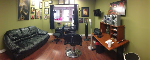 Explore cancer ribbon tattoo ideas, creative tattoo ideas in Pinellas Park, available at Lollis Studios Tattoo Company