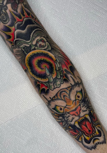 Explore football tattoo ideas, creative tattoo ideas in Tampa, available at HAWKS ELECTRIC TATTOOS