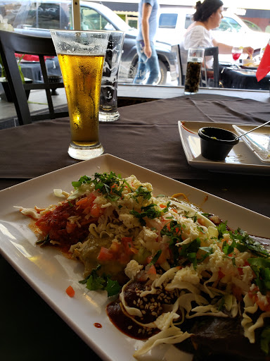 Latin American Restaurant «De La Vega Restaurante y Galeria», reviews and photos, 128 N Woodland Blvd, DeLand, FL 32720, USA