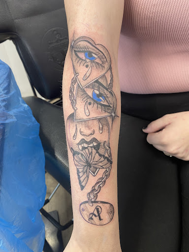 Explore gothic tattoo ideas for men, creative tattoo ideas in Elizabethtown, available at Electric Feel Tattoos