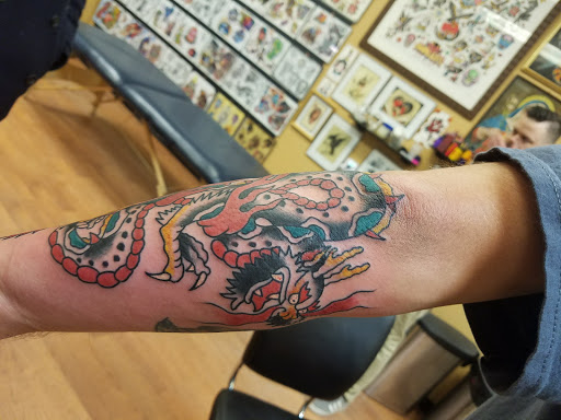 Explore tattoo ideas for outdoorsmen, creative tattoo ideas in Concord, available at Sterling Tattoo Club