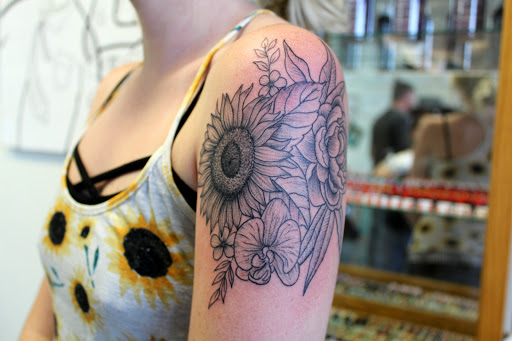 Explore tattoo cover up ideas for dark tattoos, creative tattoo ideas in Fort Myers, available at Tiger Lotus Tattoo and Piercing