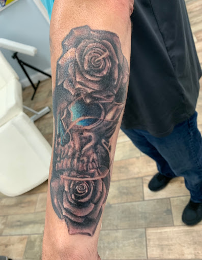 Explore tattoo ideas mother and son, creative tattoo ideas in Buford, available at Wild Tribe Tattoos and Piercings