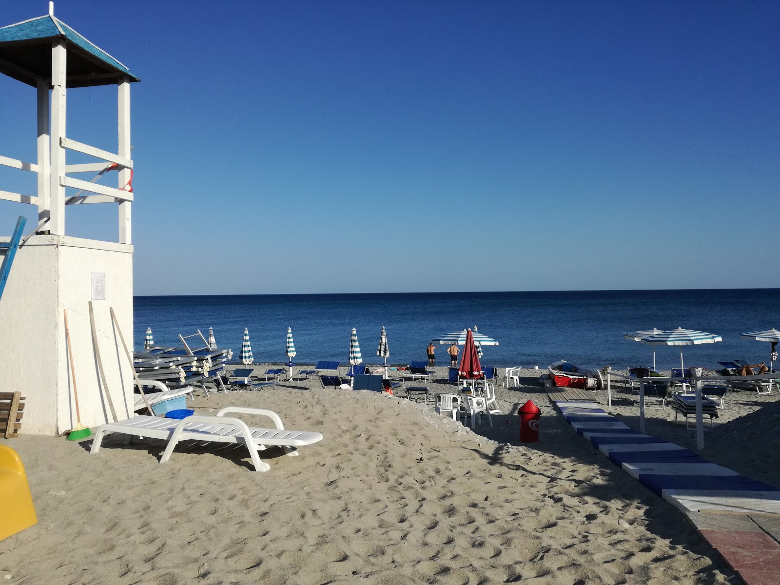 Photo de Portigliola's Beach avec rivage droit, long