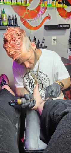 Explore word tattoo cover up ideas, creative tattoo ideas in Stuart, available at Kenny Tats Inkcorporated