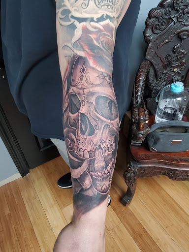 Explore mom name tattoo ideas for guys, creative tattoo ideas in Dorchester, available at Holistic Ink Boston Tattoo Shop