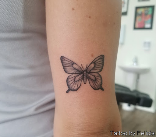 Explore half sleeve tattoo ideas for men, creative tattoo ideas in Fort Myers, available at Tiger Lotus Tattoo and Piercing