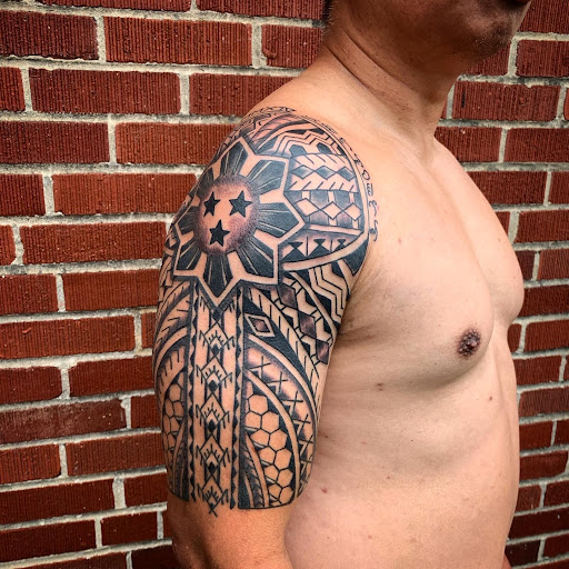 Explore thigh tattoo ideas male, creative tattoo ideas in Strasburg, available at Champion Tattoo Company