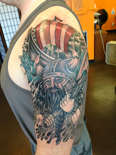 Explore cliff tattoo ideas, creative tattoo ideas in Everett, available at Tattoosmith & Company