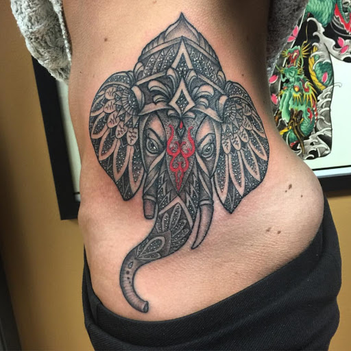 Explore car tattoo ideas, creative tattoo ideas in Cocoa Beach, available at 13 Waves Tattoo