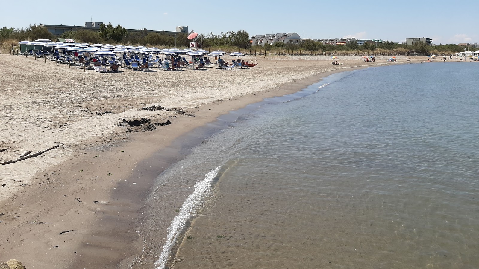 Zdjęcie Bacucco beach II z powierzchnią jasny, drobny piasek