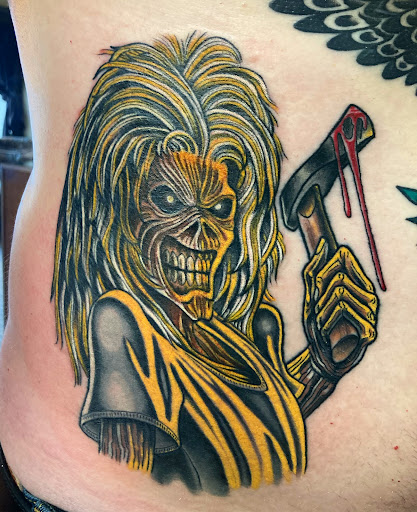 Explore elton john tattoo ideas, creative tattoo ideas in Libertyville, available at Art With Atattooed