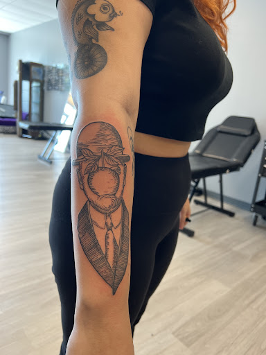 Explore country tattoo ideas for guys, creative tattoo ideas in Cocoa, available at Rorschach Tattoo Shop and Piercing Studio