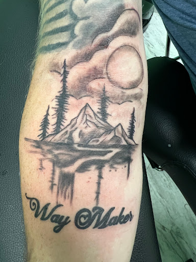 Explore daughter tattoo ideas for men, creative tattoo ideas in Warner Robins, available at Pen & Portrait Tattoos