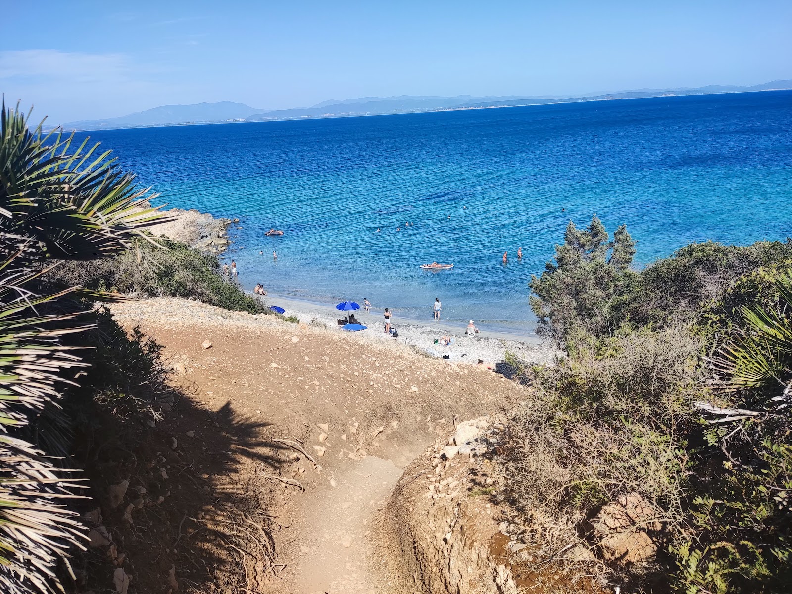 Portixeddu Accuau Beach'in fotoğrafı doğal alan içinde bulunmaktadır