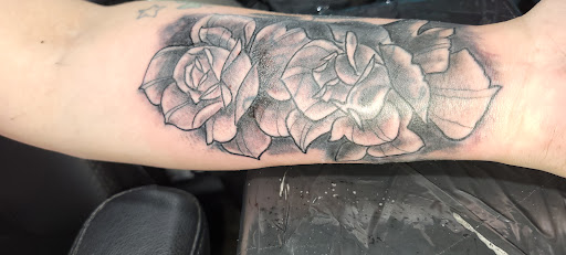 Explore man hand tattoo ideas, creative tattoo ideas in Canton, available at DEAD KAT TATTOO