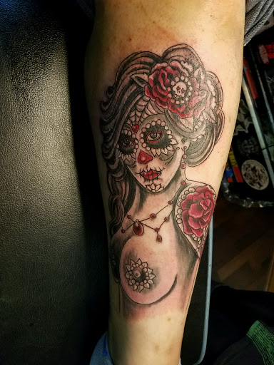 Find halloween tattoo ideas for your next unique tattoo in Woodland Park at Above The Clouds Tattoo