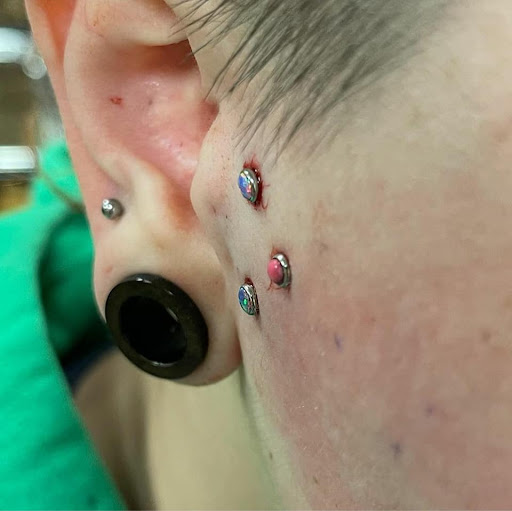 Explore police tattoo ideas, creative tattoo ideas in Charleston, available at Exotic Impressions Body Piercing