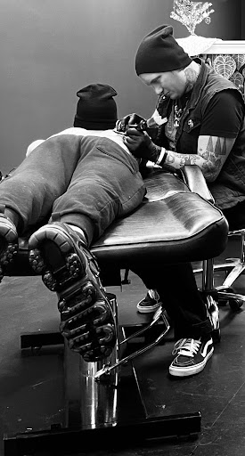 Explore popeye tattoo ideas, creative tattoo ideas in Grand Island, available at The Shaded Dahlia Piercing & Tattoo Parlor