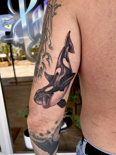 Explore half sleeve tattoo ideas for guys, creative tattoo ideas in Fort Myers Beach, available at Paradise Tattoo