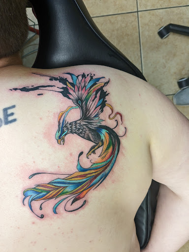 Explore dissociation tattoo ideas, creative tattoo ideas in Houston, available at The Electric Chair Tattoo & Piercing