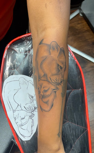 Explore lion forearm tattoo ideas, creative tattoo ideas in Somerset, available at Benny binnu tattoo