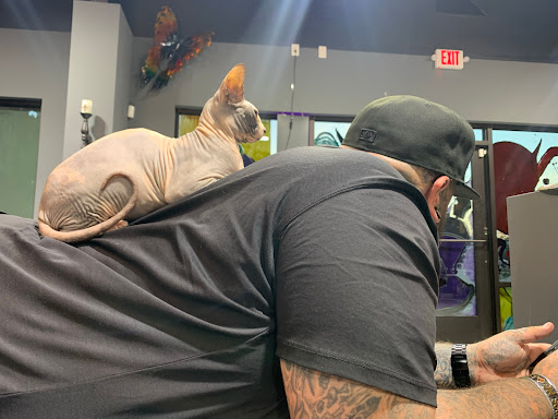 Explore black power tattoo ideas, creative tattoo ideas in Conroe, available at Monsters Ink, LLC