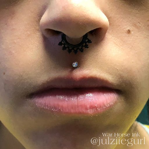 Explore black wolf tattoo ideas, creative tattoo ideas in Kent, available at War Horse Ink