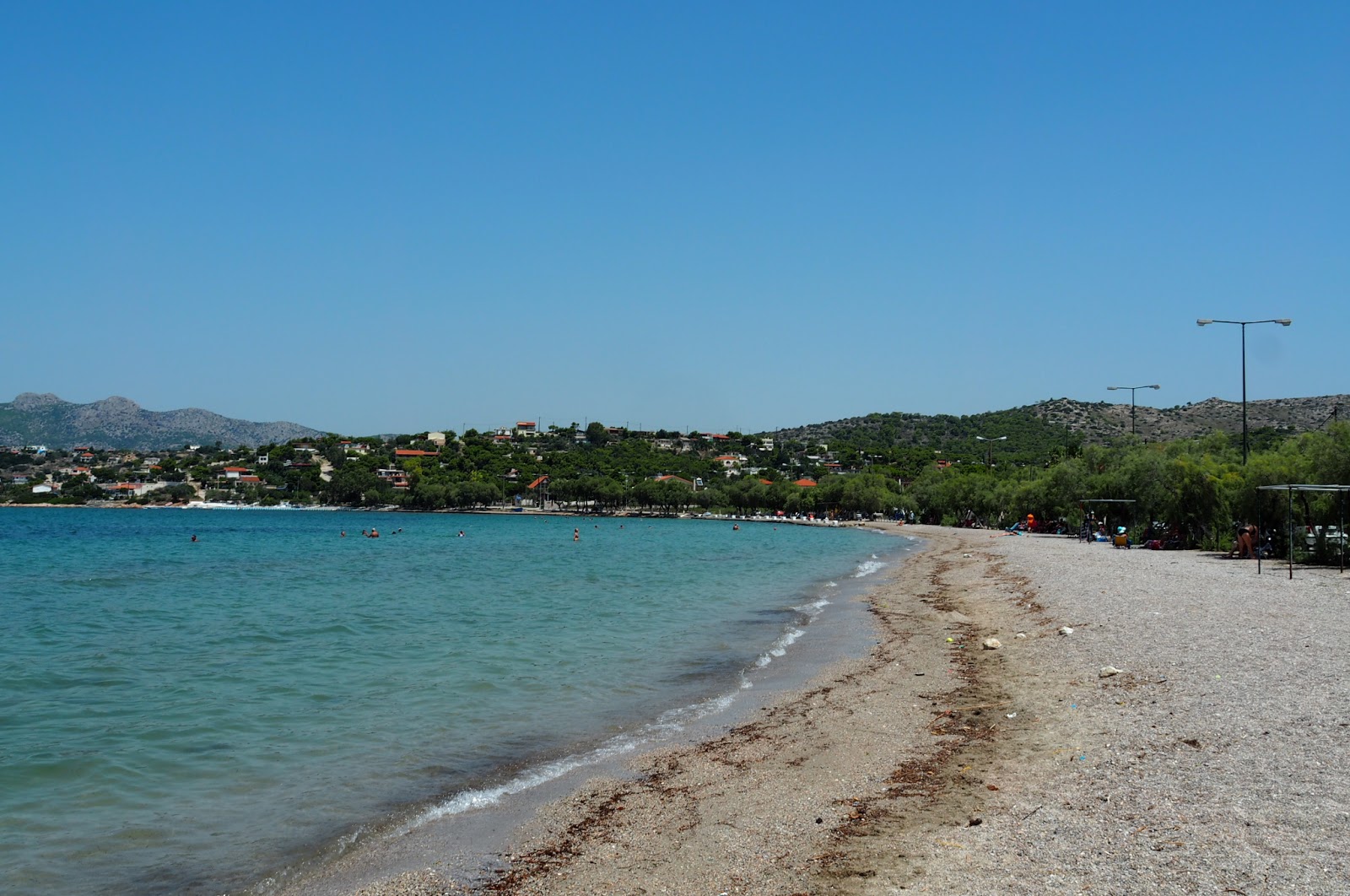Foto di Paralia Vasilika con una superficie del piccoli ciottoli beige