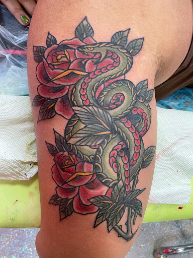 Explore tattoo ideas for bicep, creative tattoo ideas in Houston, available at The Neon Jackal Tattoo