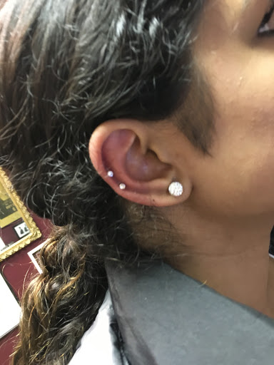 Explore cover up tattoo ideas lower back, creative tattoo ideas in Farmington, available at TATTOO 13 & Laser Tattoo Removal