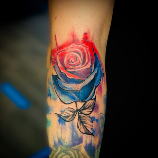 Explore tombstone movie tattoo ideas, creative tattoo ideas in Ronkonkoma, available at Ink Buster Tattoo