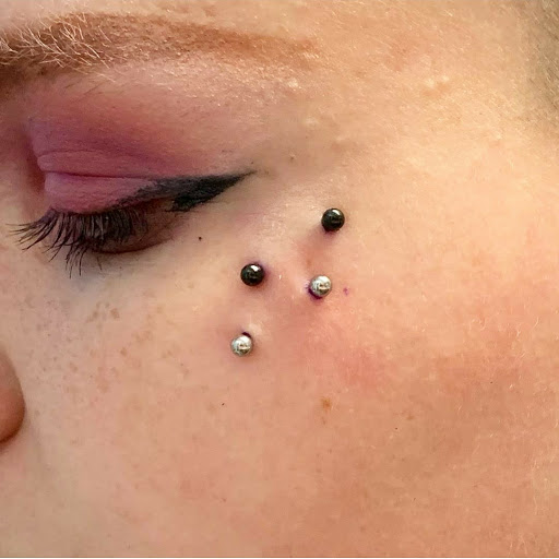 Explore spring tattoo ideas, creative tattoo ideas in Summerville, available at Exotic Impressions Body Piercing