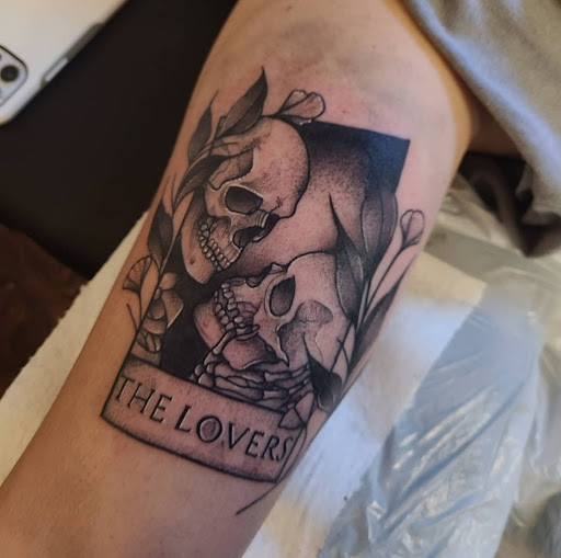 Explore arm flower tattoo ideas, creative tattoo ideas in Valdosta, available at Acid Ink Tattoos