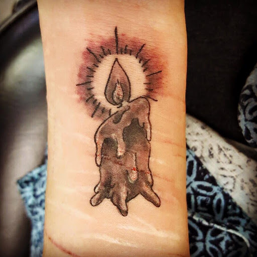 Explore rip tattoo ideas for mom, creative tattoo ideas in Milwaukee, available at Bay Street Tattoo Co.