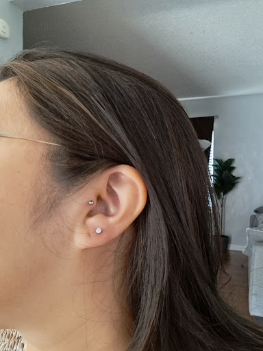 Explore thigh tattoo ideas for women, creative tattoo ideas in Carmichael, available at IIcon Piercing Co